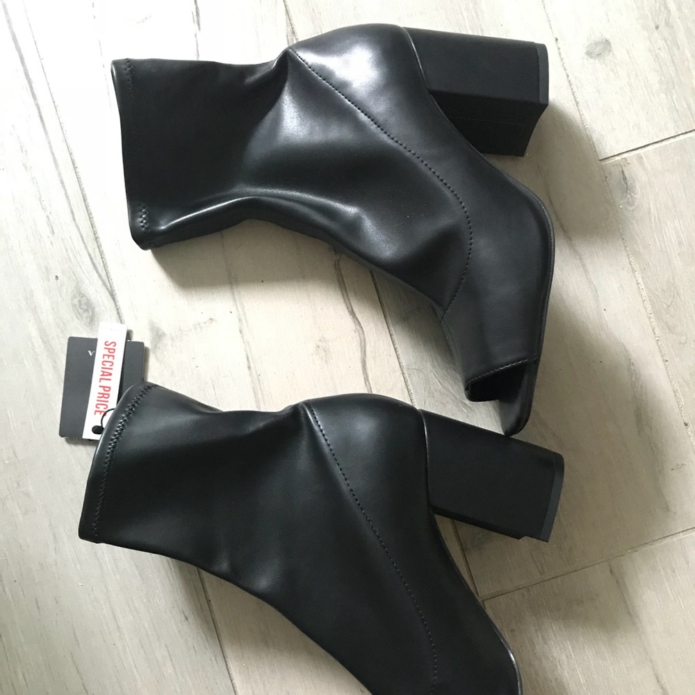 Brand new open toe boot.